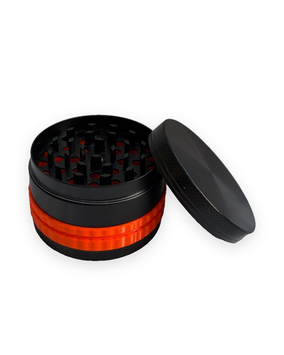 Pac n Grnd on the open grinder: the grinder teeth, the orange dock and holder, and the metal base, with the lid alongside